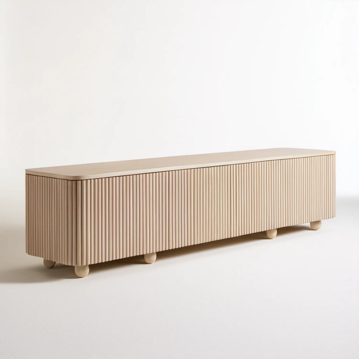 Beżowa szafka RTV z ryflowanymi frontami MDF 180 × 40 × 55 cm